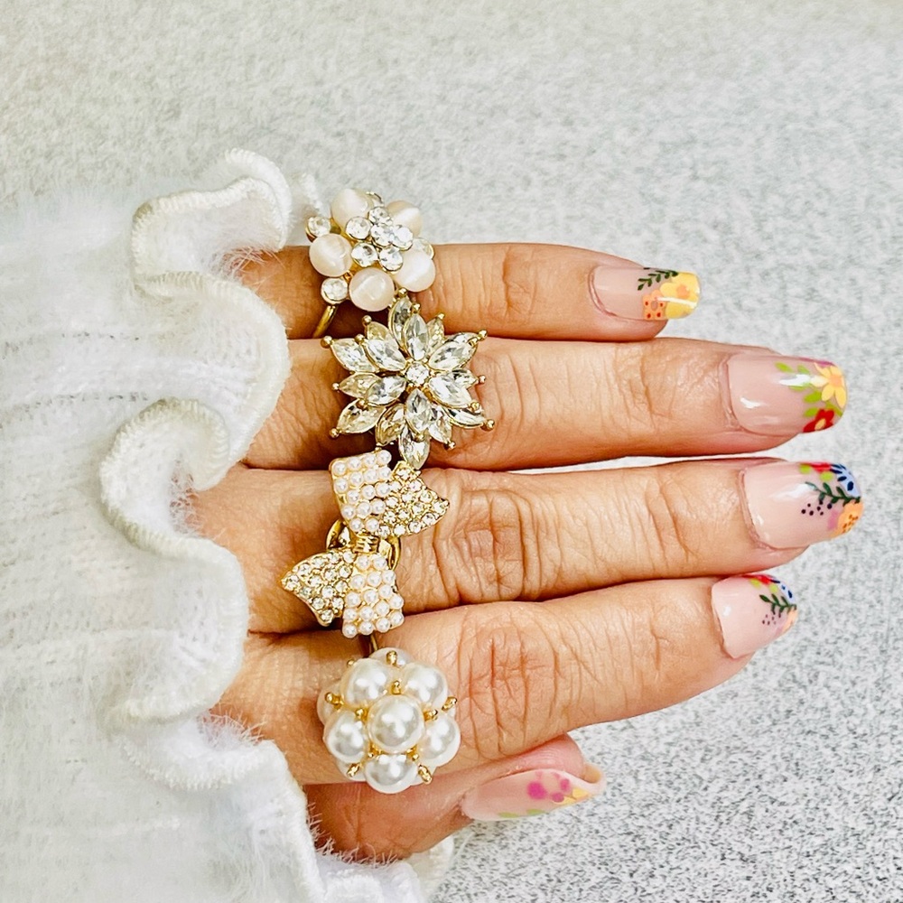Elegant Gold and Pearl Flower Rings, Each ring sold  separate , whole set for 35